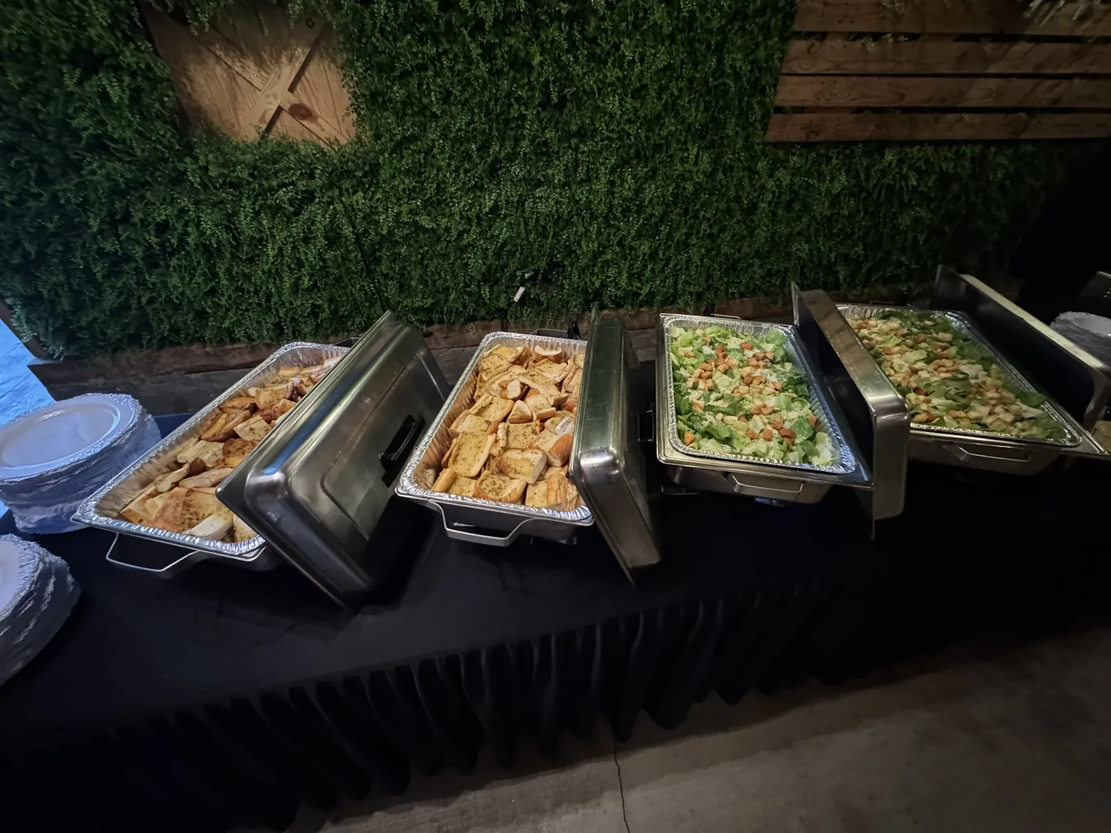A staffed buffet line at a Funkheizer's catered event