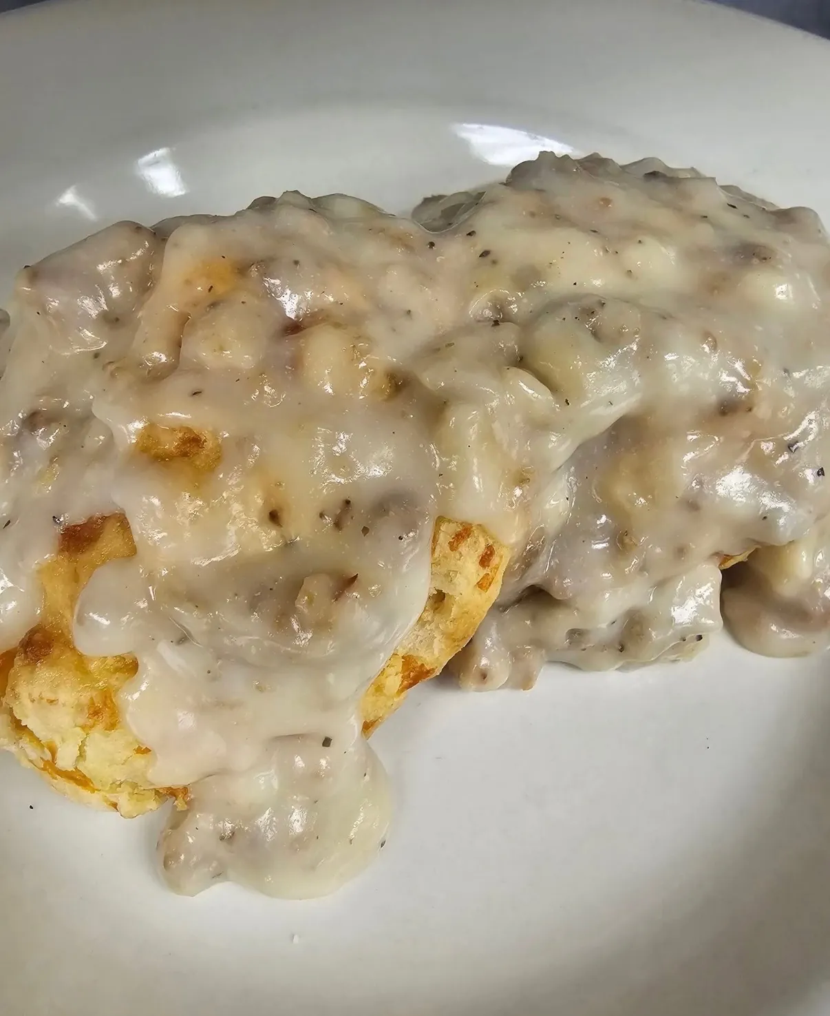 Biscuit smothered in sausage gravy at Funkheizer's