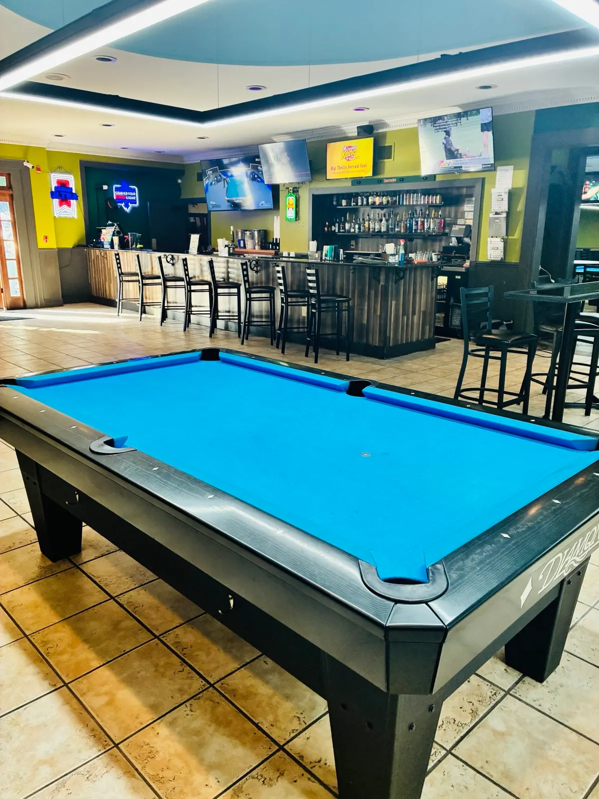 Pool tables and the bar at Funkheizer's Billiards (The Cue) in Hickory