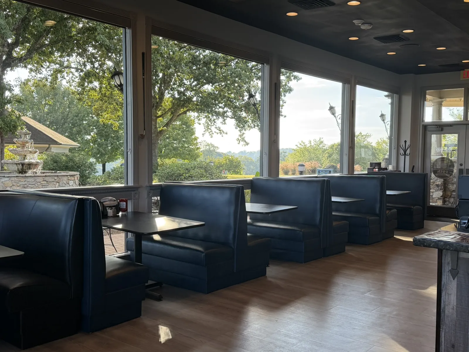 Booth seating overlooking the course at Funkheizer's 19th at Rock Barn